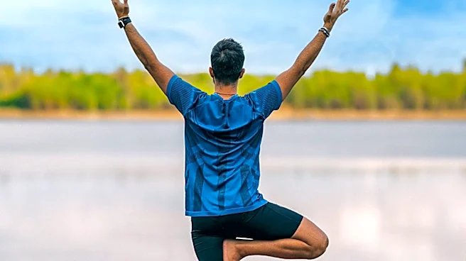 Paddleboard Yoga Gains Popularity as a Unique Wellness Activity
