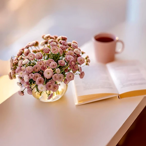 Publishers Weekly Reviews 'Flower Moments' by Native Poppy Team, Highlighting Floral Artistry and Emotional Depth