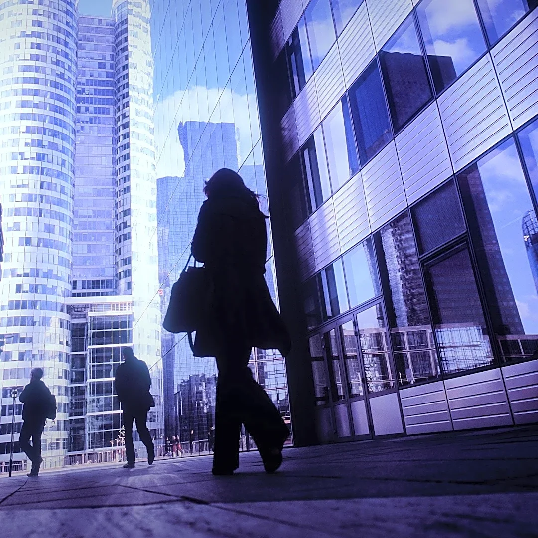 Street Photographer Captures Reflections and Silhouettes in La Défense, Paris