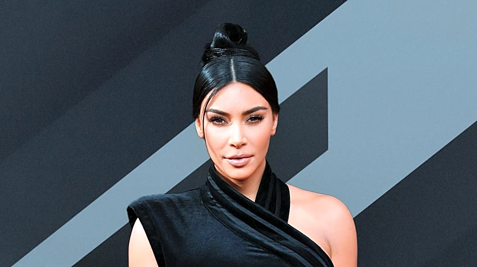Kim Kardashian Showcases Sculptural Little Black Dress on Jimmy Kimmel Live!