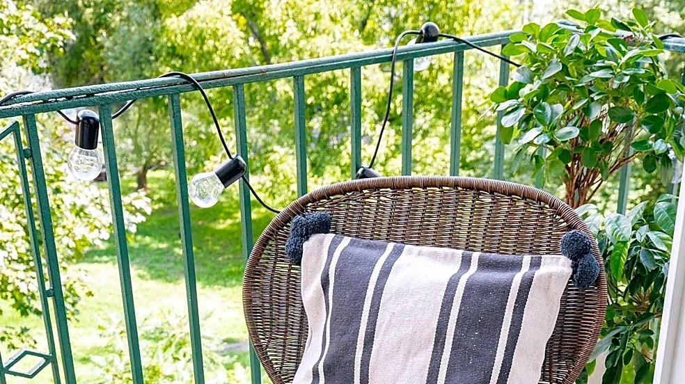Balcony Makeovers Emphasize Cozy Seating, Greenery, and Smart Lighting for Enhanced Outdoor Living