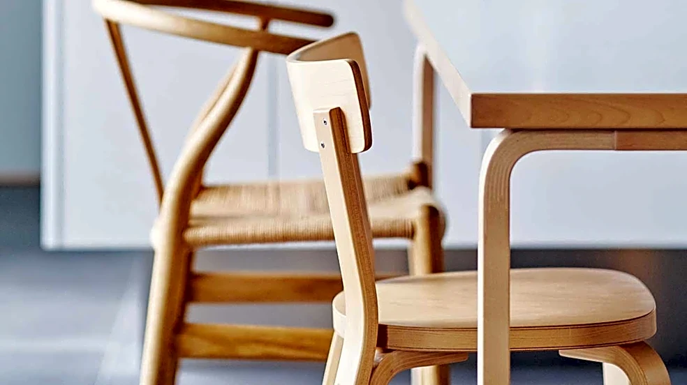 Scandinavian Minimalism Emphasizes Light Wood, Natural Textiles, and Clutter Reduction in Interior Design