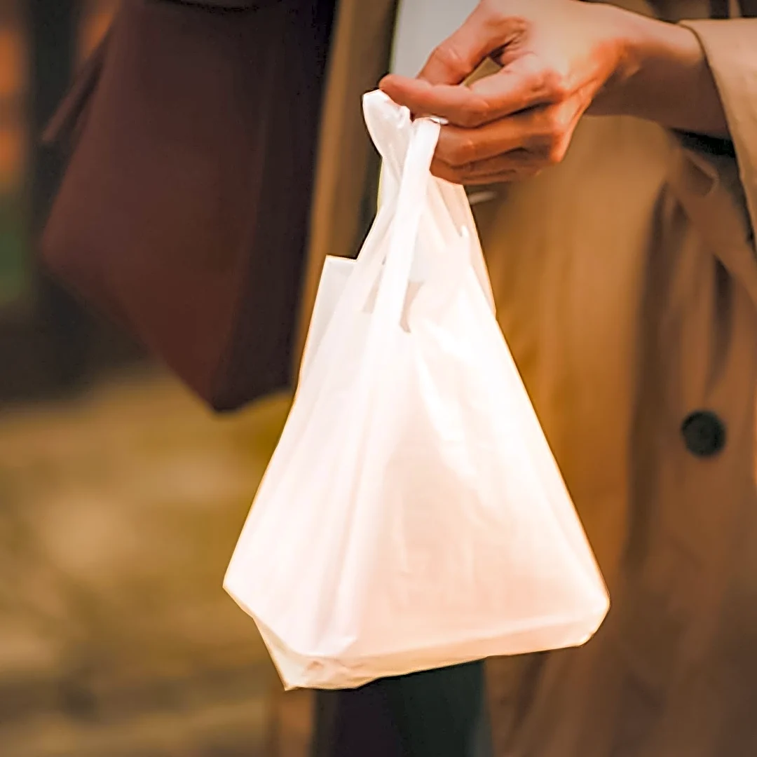YouTuber Fred Beyer Disrupts New York Fashion Week Runway in Plastic Bag Attire