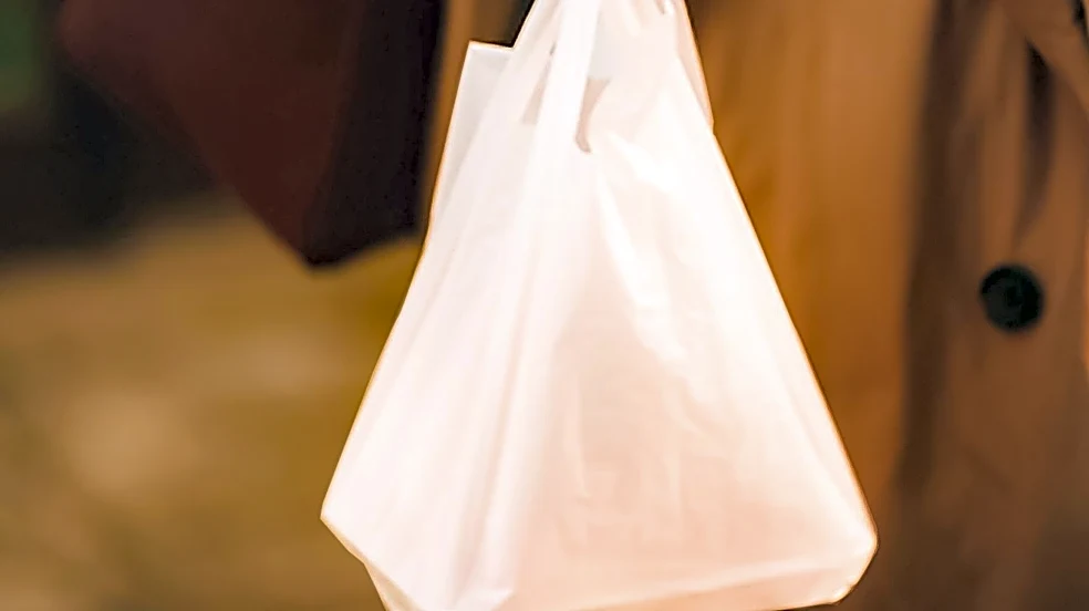 YouTuber Fred Beyer Disrupts New York Fashion Week Runway in Plastic Bag Attire