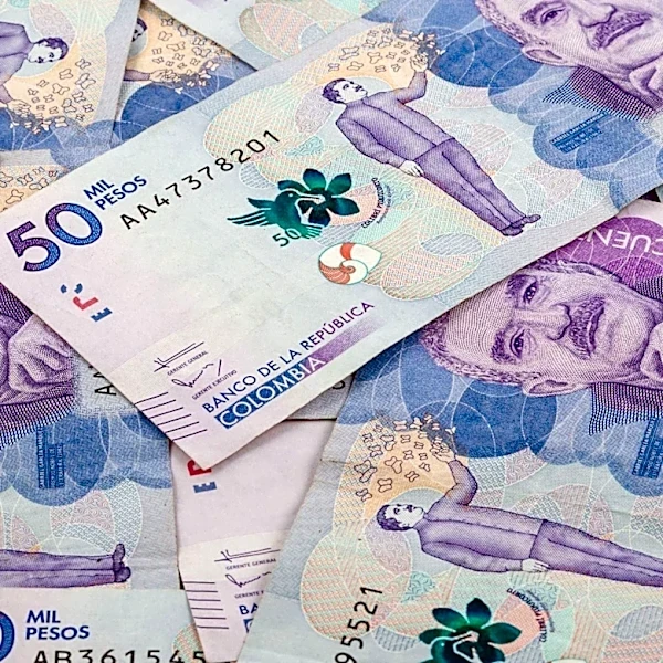 Colombia's Central Bank Maintains Benchmark Interest Rate at 12.25% Amidst Inflation and Economic Slowdown Concerns