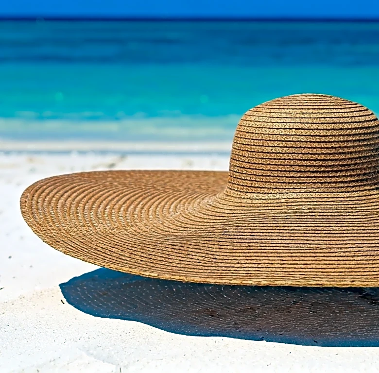 The Oversized Straw Hat Is Still Swim Week's Most Dramatic Accessory