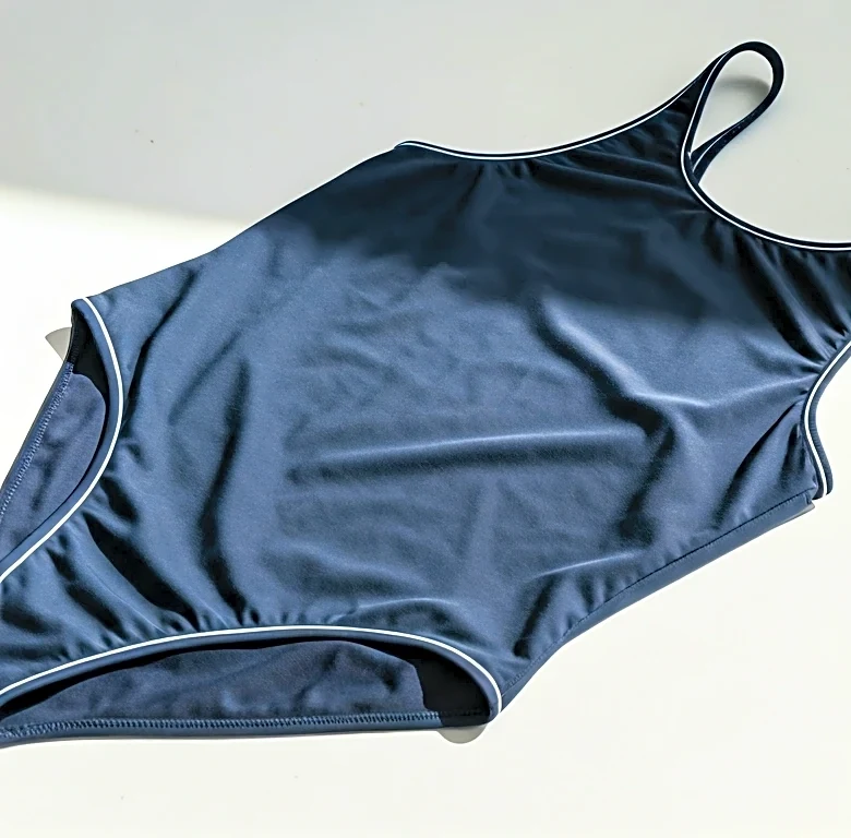 The Return of Graphic Piping in Sport-Luxe Swimwear