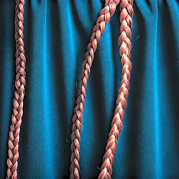 How Braided Details Protect Hair and Finish Swimwear Styling