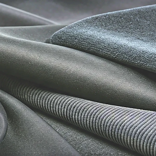 The Subtle Fabric Clash That Makes an All-Black Outfit Feel Rich