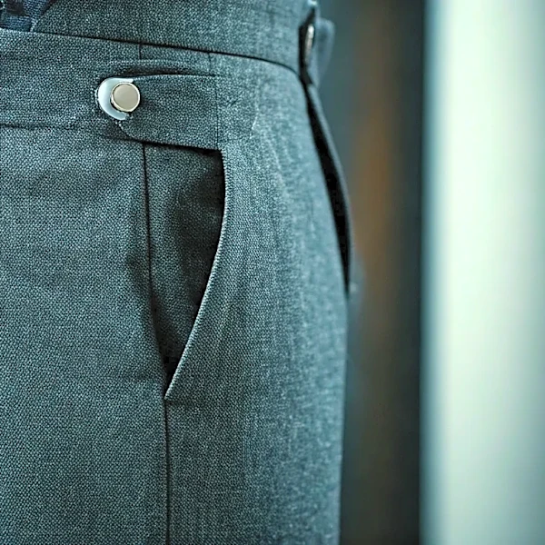 How Pitti Uomo Men Use Belts, Side Tabs, and Braces to Control Proportion