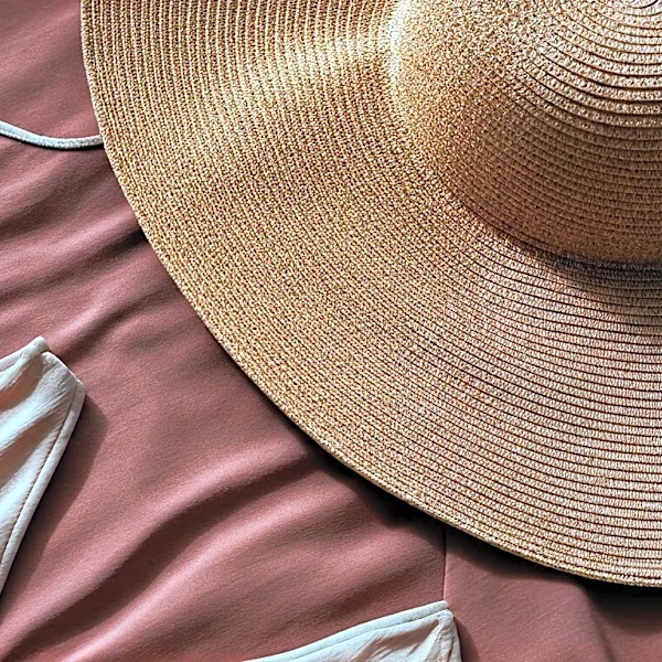The Exact Necklines That Play Best With Oversized Brims