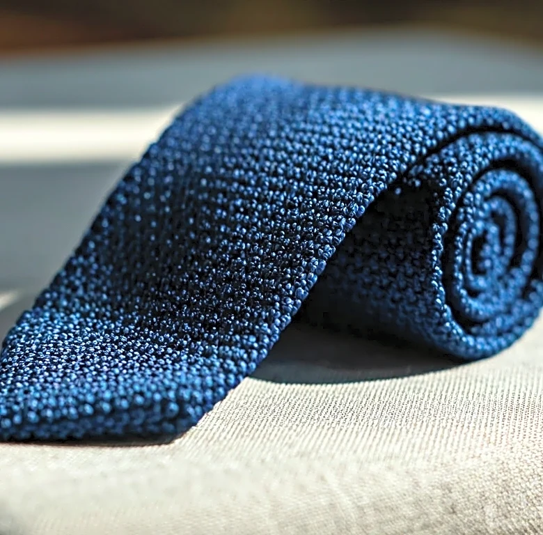 How Pitti Uomo Turned the Knit Tie Into a Summer Essential