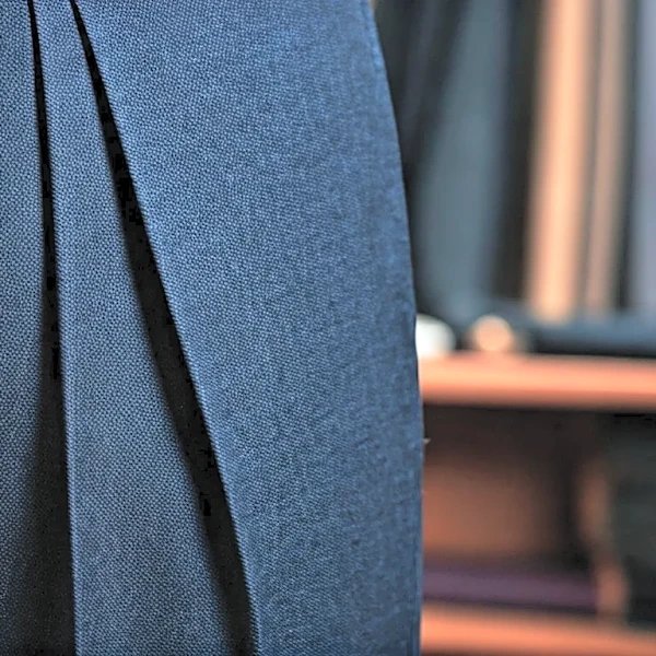 Why Luxury Menswear Fans Are Studying Milan’s Trouser Pleats