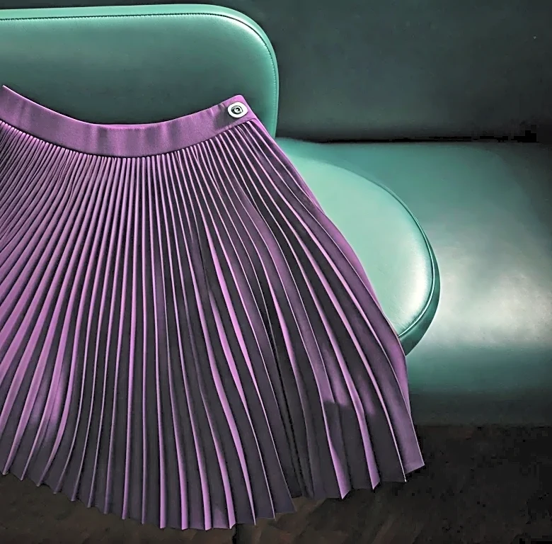The Anti-Tenniscore Styling Move for Knife-Pleat Skirts in a Wimbledon Palette