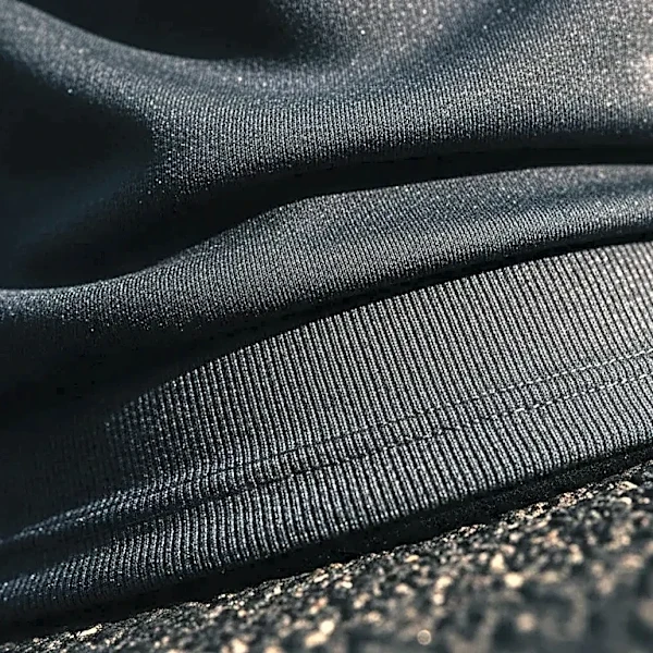 The Secret Weapon Under Oversized Jerseys: a Compact Ribbed Base Layer