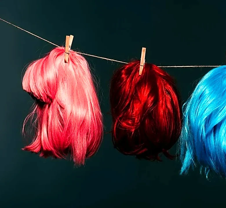 Why Dolly Parton’s Wigs Were a Work-Smart Innovation, Not Just a Signature