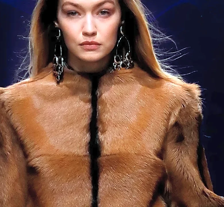 Before Copying a London Runway Hairstyle, Consider What Its Shape Does to the Outfit