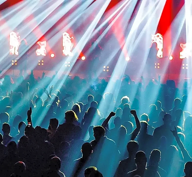 What Happens When an Arena Production Has to Fit a Shared Festival Stage