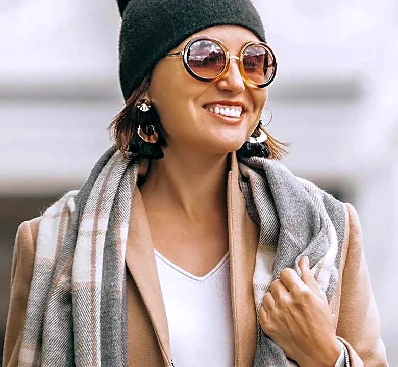 The Scarf-Styling Detail That Can Make a Basic Blazer Feel More Parisian