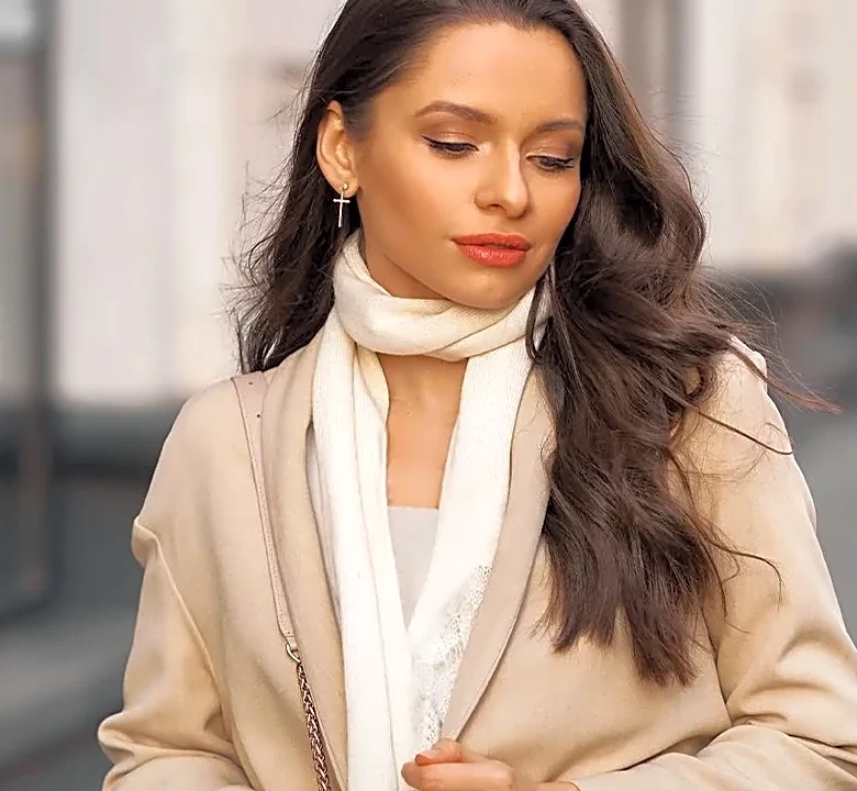 The Scarf-Tying Detail That Makes a Basic Coat Feel Intentional