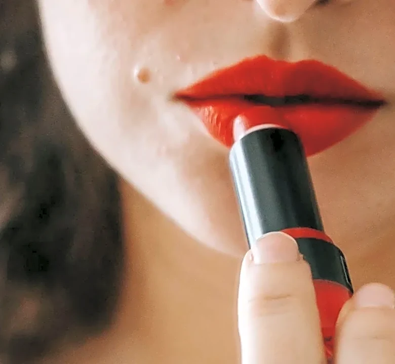 The Paris Beauty Trick for Making a Dark Lip Feel Less Formal