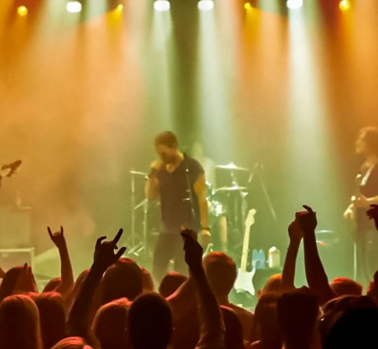 7 Rock Frontmen Who Carry Some of Bon Scott’s Swagger and Storytelling Spirit