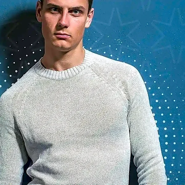 The Henley Knit Is Returning as a More Useful Alternative to the Basic Crewneck