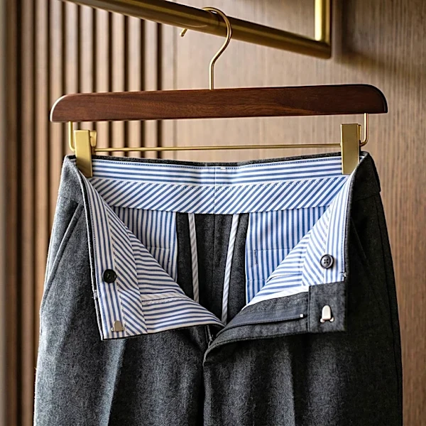 The Hidden Waistband Construction That Keeps Tailored Trousers From Rolling
