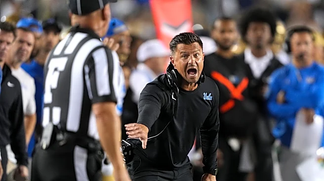 Bob Chesney awarded with the game ball after UCLA's Week 1 win