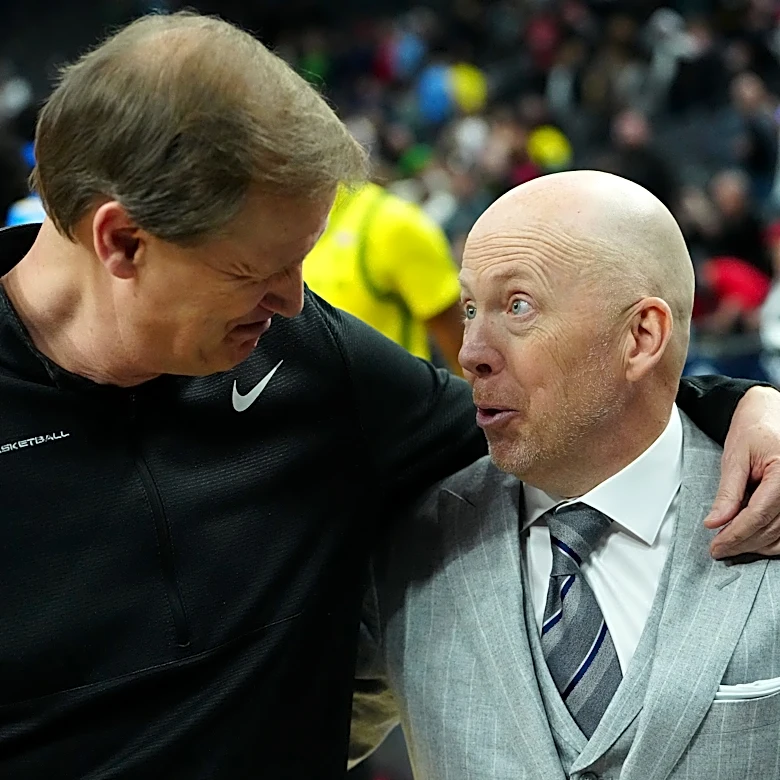 Mick Cronin congratulates Oregon's Dana Altman on his retirement