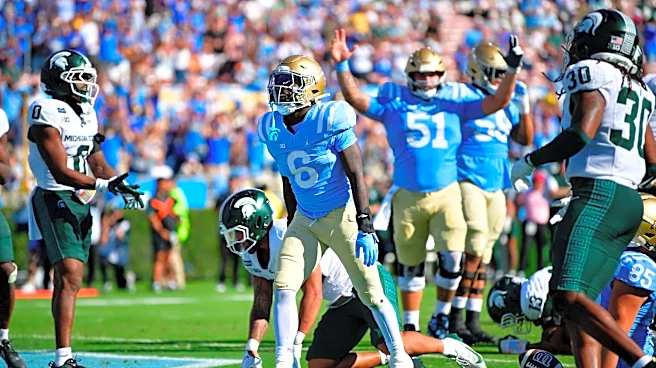 UCLA RB core 'feed off each other' according to senior Anthony Woods