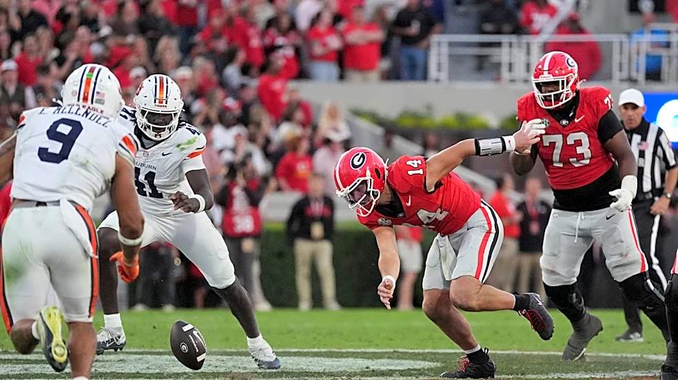 How far Georgia dropped in the US LBM Coaches Poll after Auburn loss