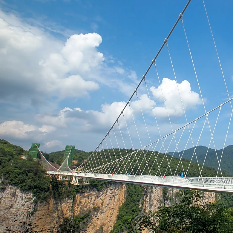 Dare to Look Down: Jaw-Dropping Glass Bridges Around the World