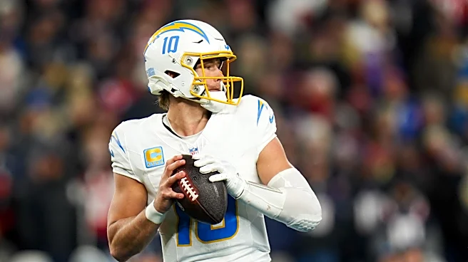 Jim Harbaugh 'happy' Justin Herbert skipped OTA session to support Madison Beer