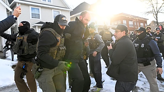 ICE officer arrested for allegedly shooting Minnesota man through front door