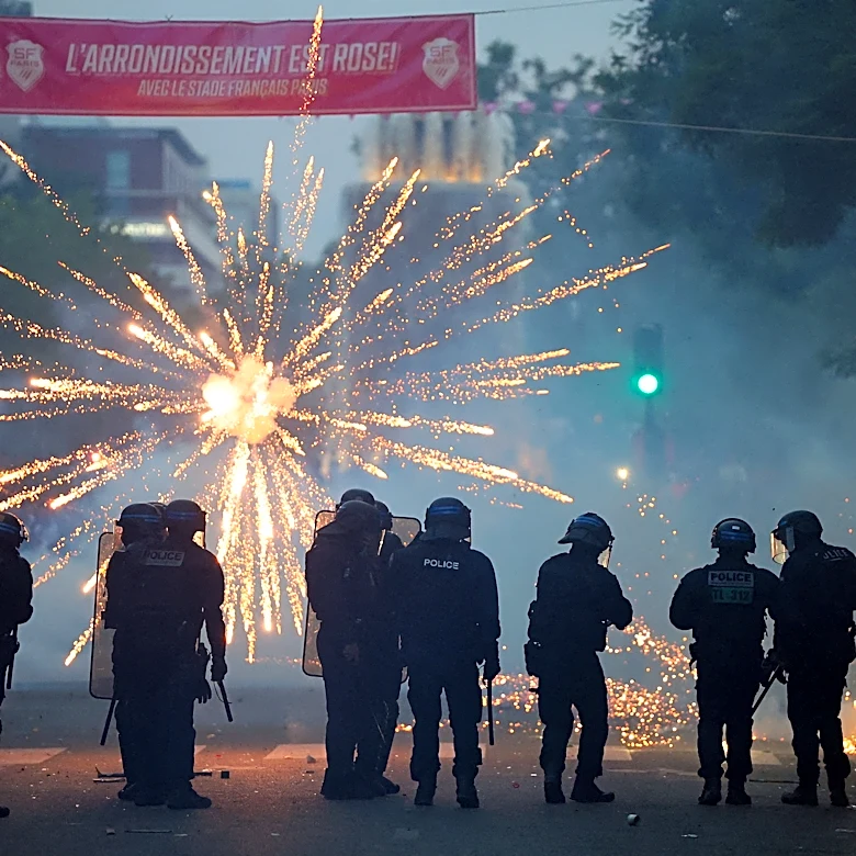 PSG supporters spill onto Paris streets, some clashes with police