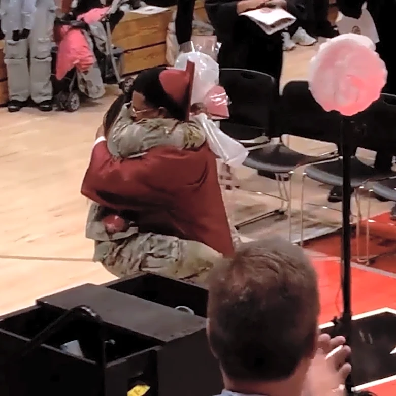 From deployment to diploma day, watch a sister's surprise steal the show