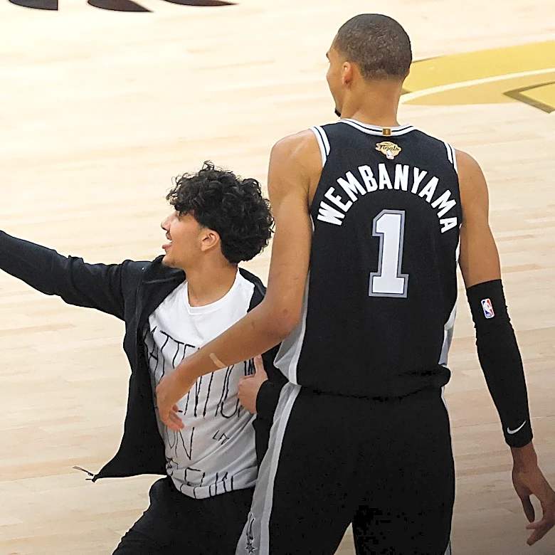 NBA Finals fan who ran onto court for Wemby selfie arrested, banned