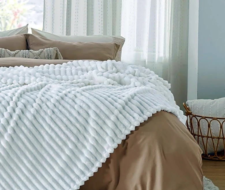 I own 3 of these 'cloud-like' blankets—and they're under $15 at Amazon