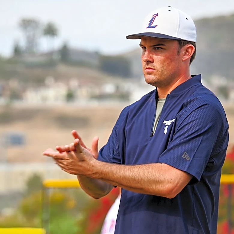 Coach Brenden White just turned 20. He also just turned around Lynbrook baseball