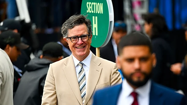 Colbert rocks tan suit after controversial Obama fashion choice