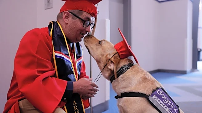 Service dog helps veteran reach graduation day