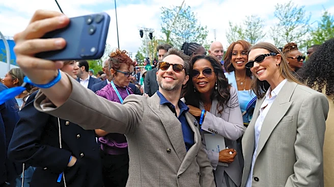 See Tom Hanks hug Pelosi, more celeb moments at Obama center opening