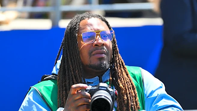 Marshawn Lynch was a photographer for USA soccer's World Cup match