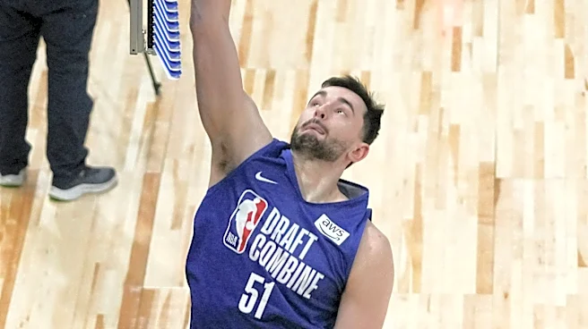 Kings trade picks with Cavaliers to land Alex Karaban at No. 29