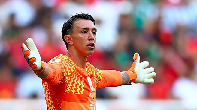 Uruguay manager Marcelo Bielsa pulls goalkeeper Muslera at halftime after gaffe