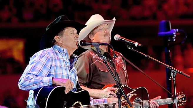 George Strait joins Alan Jackson in rare appearance at farewell show
