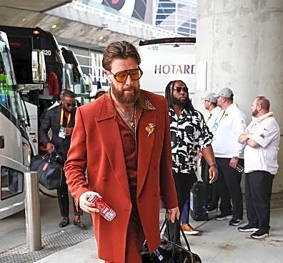 Travis Kelce marries Taylor Swift in a tux by Christian Dior