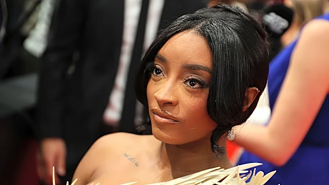 Simone Biles sets record straight about Swift, Kelce wedding invite