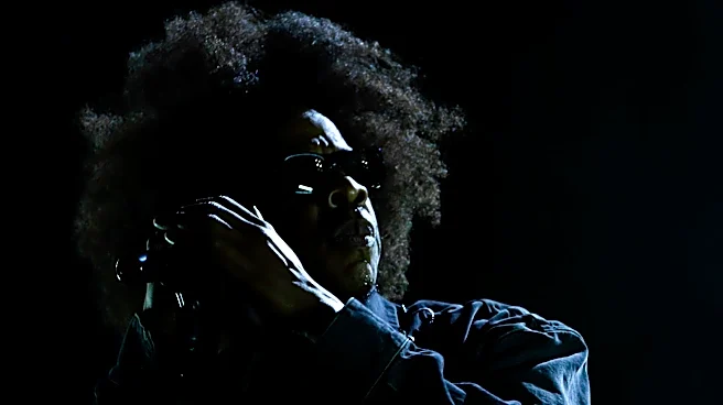 Jay-Z takes the stage after midnight at Yankee Stadium after massive delay